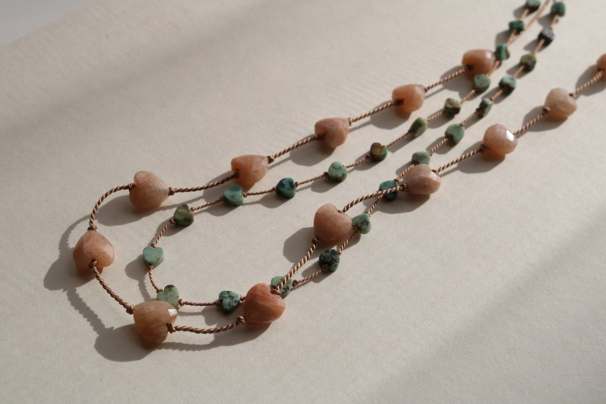 AFRICAN TURQUOISE JASPER HEARTS OM NECKLACE Vibe Necklaces