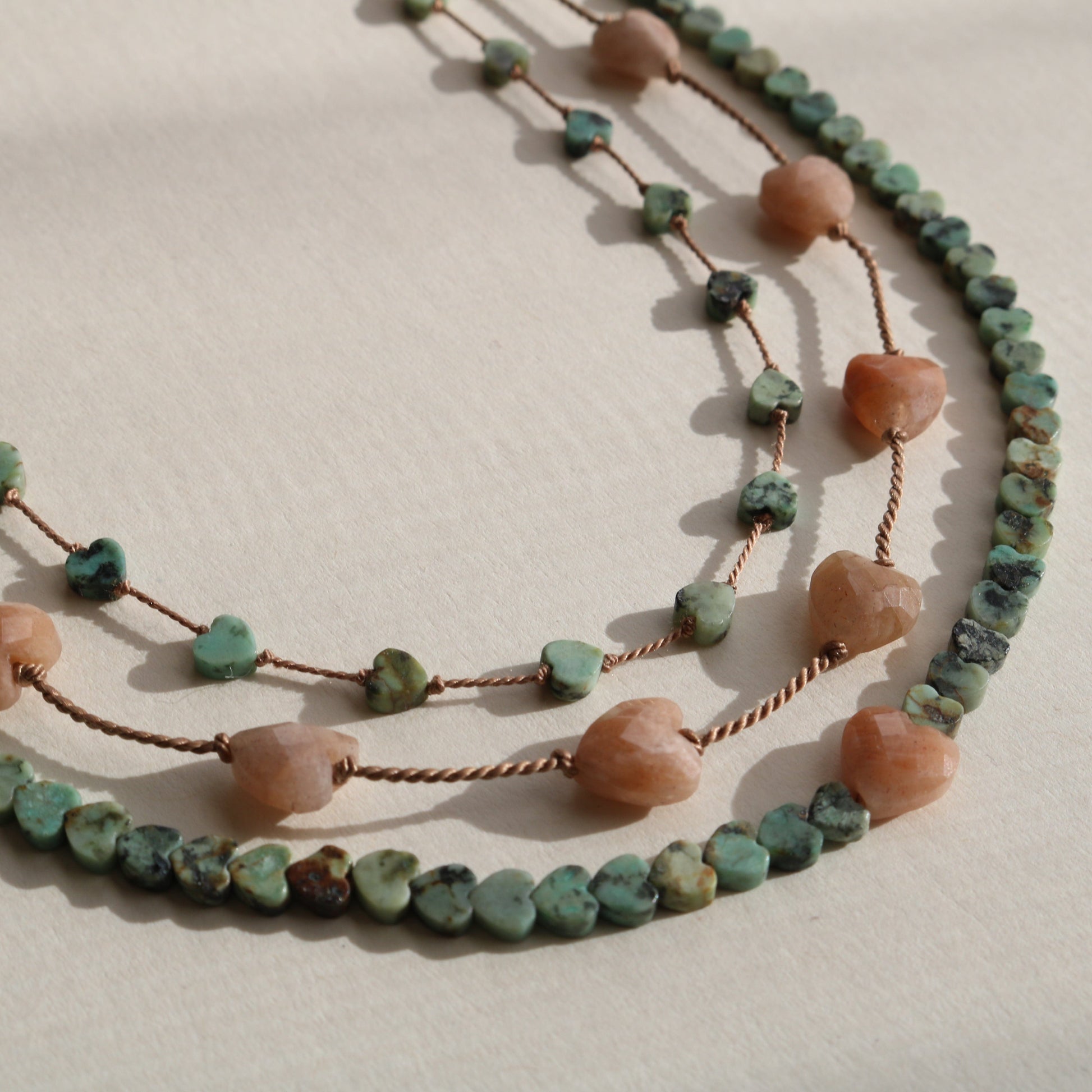 AFRICAN TURQUOISE JASPER HEARTS OM NECKLACE Vibe Necklaces