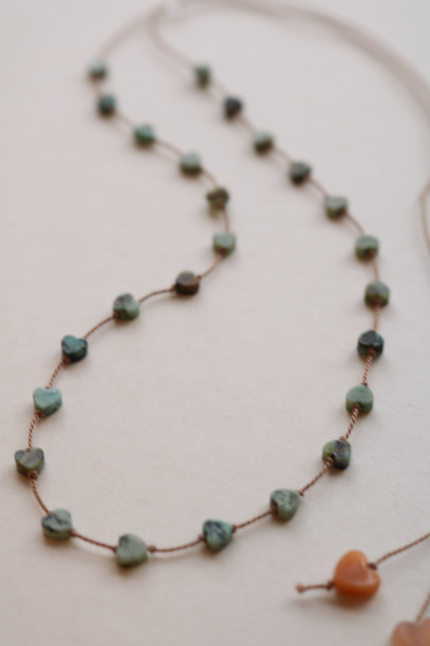 AFRICAN TURQUOISE JASPER HEARTS OM NECKLACE Vibe Necklaces