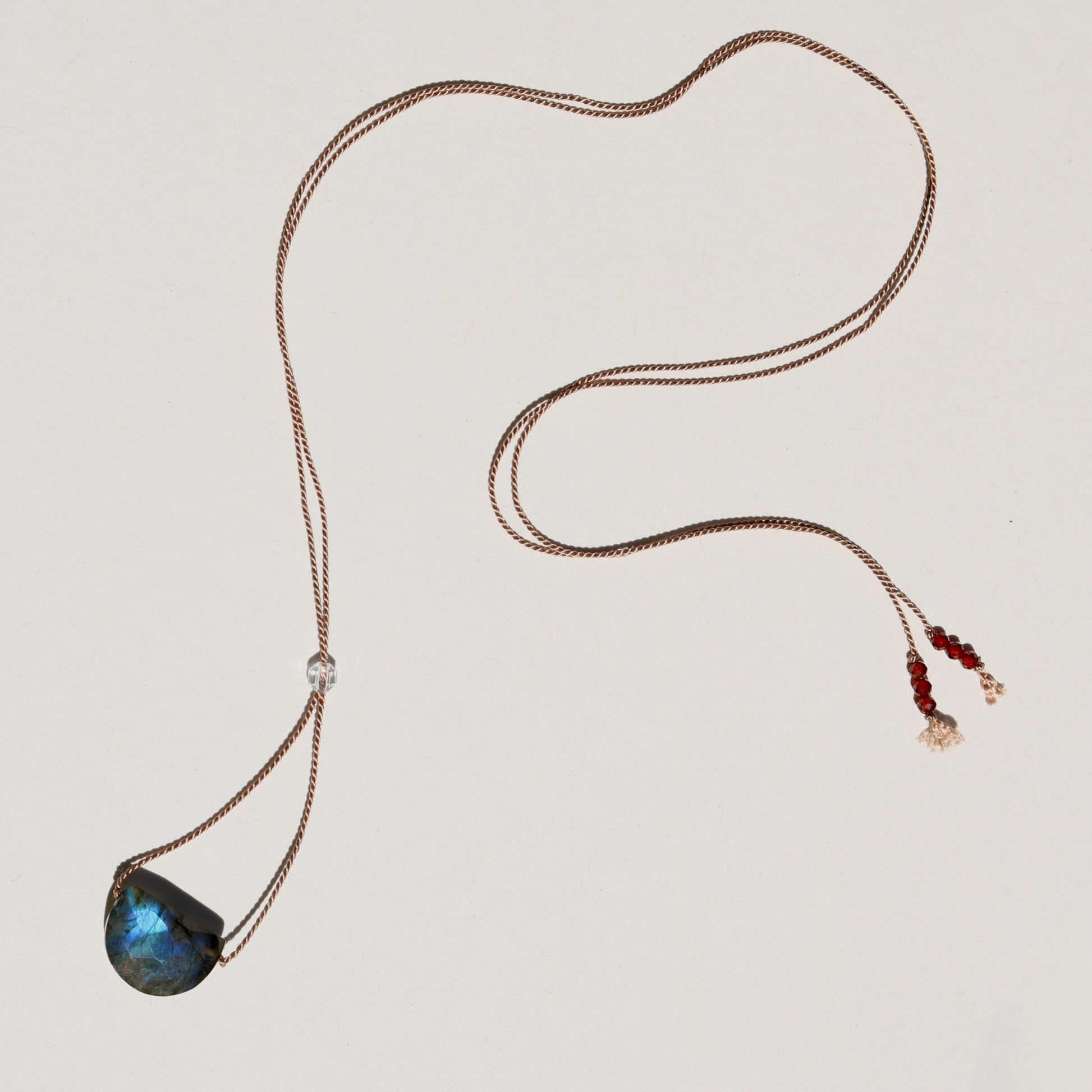 labradorite necklace with adjustable silk cord laid flat
