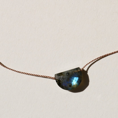 labradorite pendant on silk cord necklace close-up