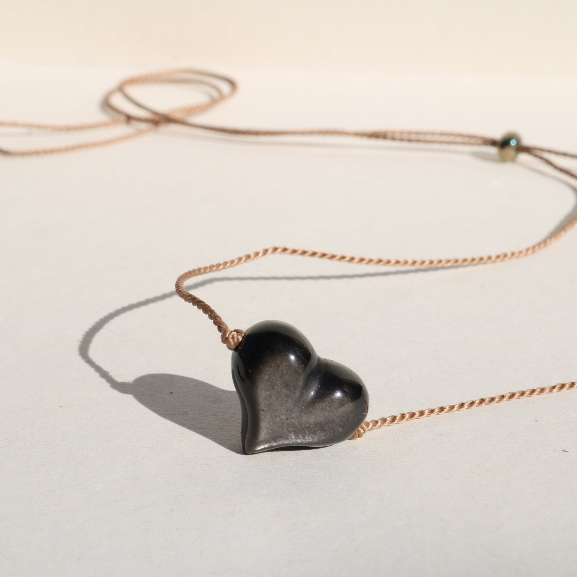 SILVER SHEEN OBSIDIAN HEART NECKLACE Vibe Necklaces