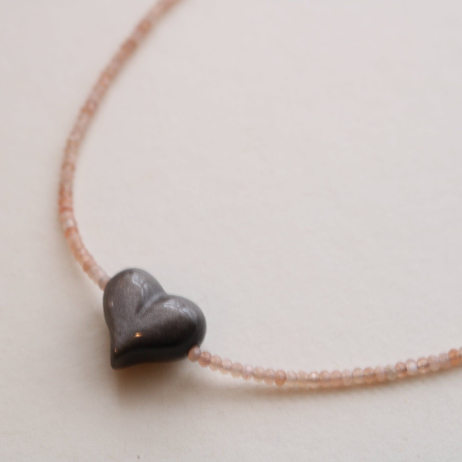 SILVER SHEEN OBSIDIAN HEART + PEACH MOONSTONE OM NECKLACE Vibe Necklaces